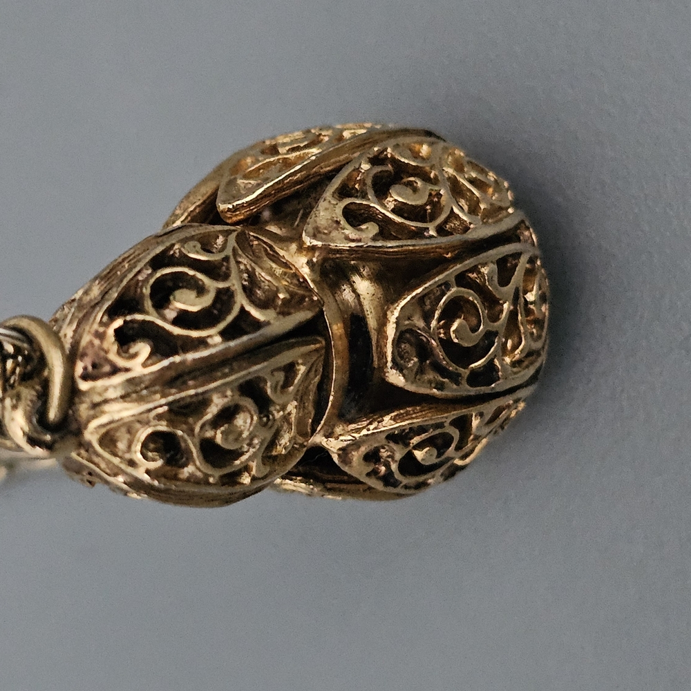 Elegant Gold Filigree Pendant